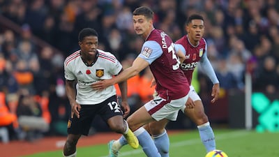 SUBS: Tyrell Malacia - 5 On for Shaw after 65 in a triple substitution. Little impact. Getty