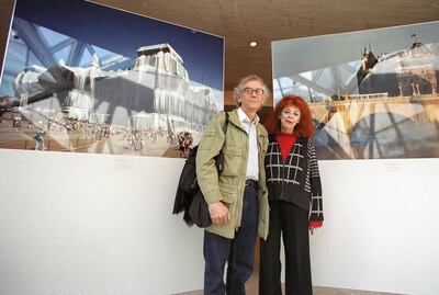 Christo (L) and Jeanne-Claude (R) pose for a photo at the National Gallery of Art in Washington, DC in 2002 . AFP