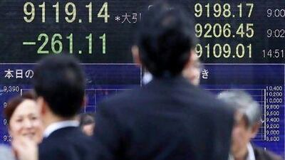 Asian stock markets, including the Nikkei, fell the most since November after Francois Hollande's election as the French president. Kiyoshi Ota / Bloomberg News