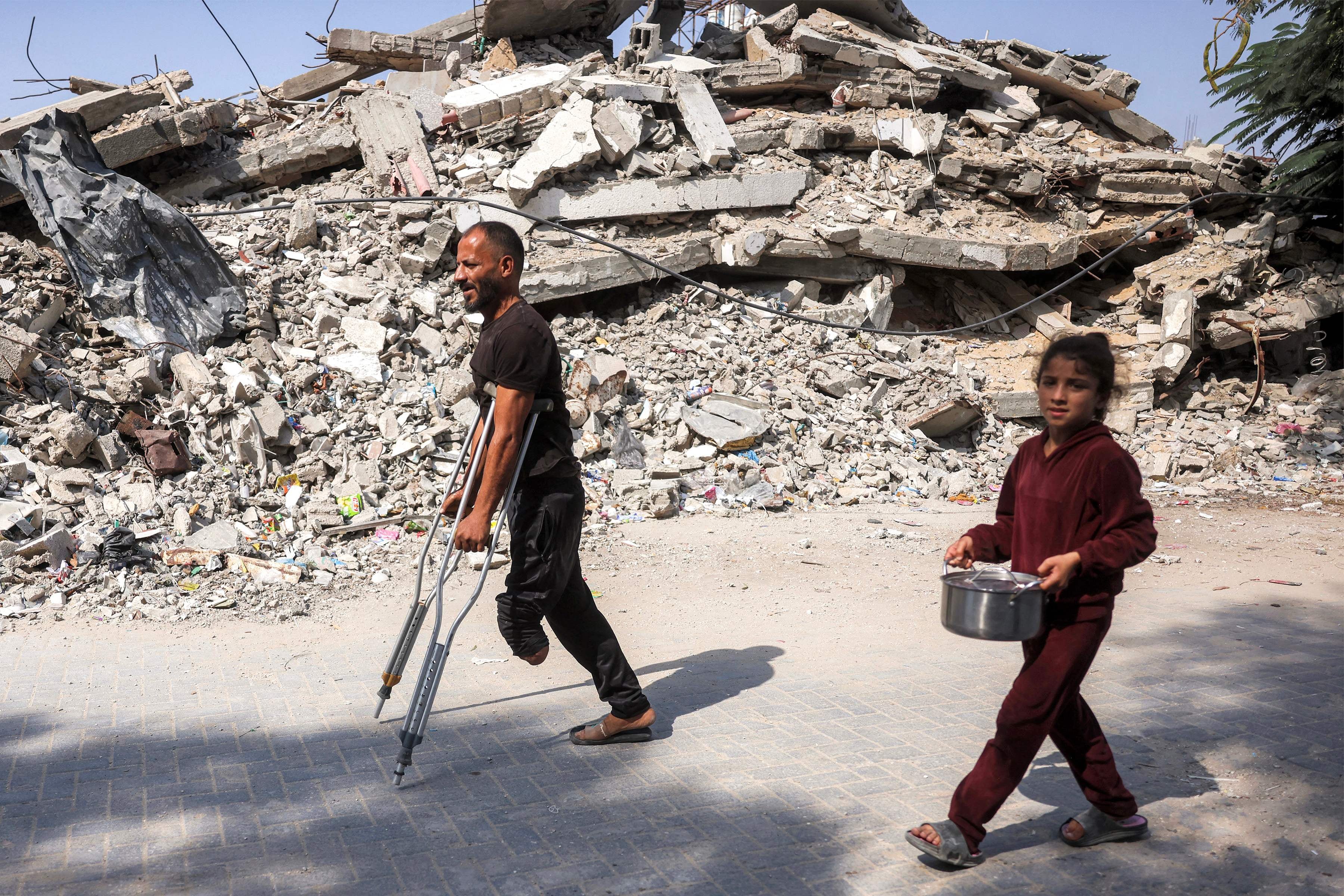 Displaced Palestinians in Gaza's Jabalia camp. Israeli military operations, reinforced by settler violence, amount to widespread and systematic attack on Palestinian civilians, UN-backed investigators say. AFP