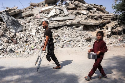 Displaced Palestinians in Gaza's Jabalia camp. Israeli military operations, reinforced by settler violence, amount to widespread and systematic attack on Palestinian civilians, UN-backed investigators say. AFP