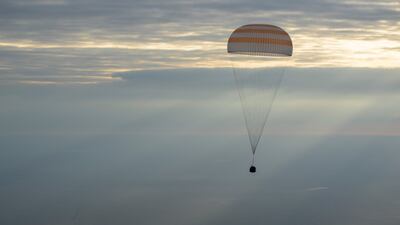 The capsule from a Soyuz MS-26 spacecraft lands in a remote area near the town of Zhezkazgan, Kazakhstan, with Roscosmos cosmonauts Alexey Ovchinin and Ivan Vagner and Nasa astronaut Don Pettit aboard on April 20. AP Photo