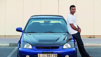 Mario Dias pictured with his 1999 Honda Civic. Jaime Puebla / The National