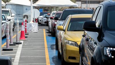 Motorists queue for PCR tests at Seha's testing and vaccination centre on Abu Dhabi's Corniche.