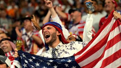 Supporters cheer on the stands before the World Cup round of 16 soccer match between the Netherlands and the United States, at the Khalifa International Stadium in Doha, Qatar. AP Photo