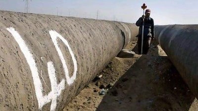 Workers build a pipeline for transporting natural gas to Israel in north Delta Nile, 300km north of Cairo.