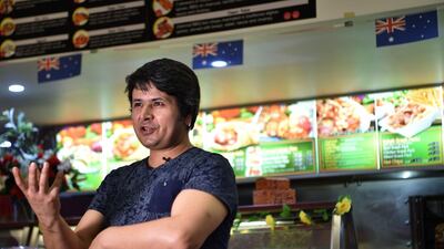 Hazara refugee Ali in his "Afghan Friendship Restaurant" in Griffith, a tribute to the warm welcome he says he received after moving to the town five years ago. AFP