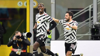 Manchester United's Paul Pogba celebrates scoring their first goal with Bruno Fernandes. Reuters