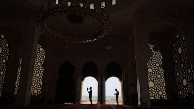 Worshippers pray at Gaza City's Al Khaledi Mosque on the third Friday of Ramadan. AFP