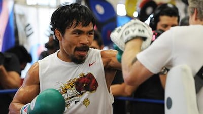 Manny Pacquiao in training ahead of his fight with Juan Manuel Marquez - the two could meet again in Dubai this September.