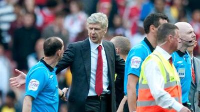 Arsene Wenger, second from left, has been animated on the touchline in recent times.
