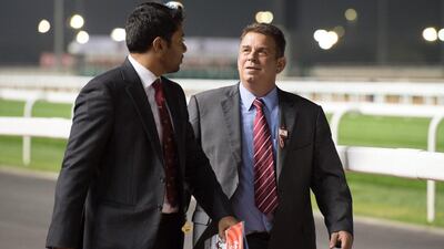 UAE champion trainer Doug Watson, right, says Moshaher, a winner at Meydan on Saturday, will be aimed at the UAE 2000 Guineas. Tom Morgan / Alamy