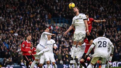 Leeds striker Patrick Bamford wins a header. AFP