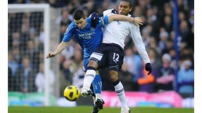 Wilson Palacios, right, and Joey Barton battle for possession during the match between Tottenham and Newcastle yesterday.