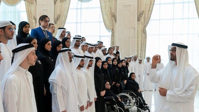 Sheikh Mohamed bin Zayed speaks to top performing pupils of Grade 12 in the UAE during a meeting at Al Bateen Palace. Rashed Al Mansoori / Ministry of Presidential Affairs