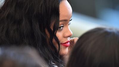 Barbadian singer Rihanna looks on during a closing ceremony ahead of the final football match. AFP