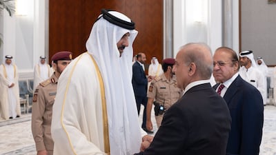 Sheikh Tamim, Emir of Qatar, receives condolences from Pakistan's Prime Minister Shehbaz Sharif following the death of his father, former leader Sheikh Hamad bin Khalifa, at Lusail Palace on the outskirts of Doha. Photo: Qatar Amiri Diwan / AFP