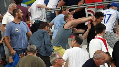 Supporters clash in the stands after the UEFA EURO 2016 group B preliminary round match between England and Russia at Stade Velodrome in Marseille, France. Daniel Dal Zennaro / EPA