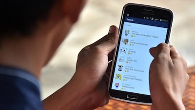 The Indonesian government has demanded all instant messaging apps remove same-sex emoticons or face a ban in the country. Bay Ismoyo / AFP Photo