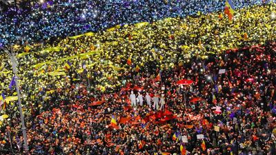 People light the flashes of their mobile phones in the colours of Romania’s flag during an anti-government protest in Bucharest. Protesters braved freezing temperatures, gathering outside the government headquarters for the 13th consecutive day to demand the government’s resignation after it passed a decree that would have diluted the anti-corruption fight that has targeted top officials. Vadim Ghird / Associated Press / February 12, 2017