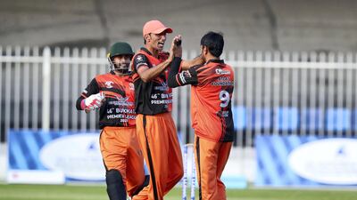 Atlas' Asif Hayat takes the wicket of Bukhatir's Renjith Mani. Bukhatir League second semifinal. Bukhatir XI v Atlas Foundation. Chris Whiteoak / The National