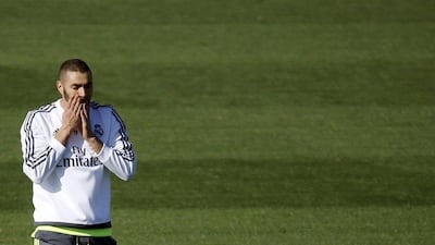 Real Madrid's Karim Benzema during a training session at the team's training grounds outside Madrid, Spain, November 7, 2015. Benzema was placed under formal judicial investigation on Thursday in connection with an alleged attempt to blackmail fellow-France soccer international Mathieu Valbuena with the use of a sex video. REUTERS/Susana Vera
