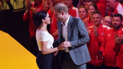 The couple received a standing ovation as they praised 'boundless humility, the compassion and the friendship” of the event. Getty Images