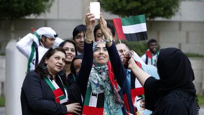 The perfect selfie for Flag Day at Dubai International Financial Centre. Ali Haider / EPA