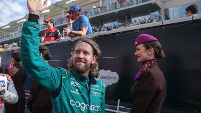 Sebastian Vettel waves to fans during the driver's parade. Victor Besa / The National