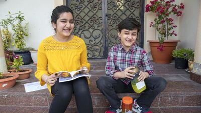 Safa Kidwai and her brother Abdullah are part of the Kidpreneurs programme at the Next Generation School in Dubai, which encourages children to become entrepreneurs and learn money management skills. Safa published a book on Amazon while Abdullah up-cycled used glass jars into charity jars. Photo: Antonie Robertson / The National