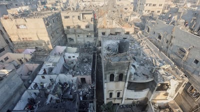 The aftermath of Israeli strikes in Khan Younis in the southern Gaza Strip, where residents said Tuesday night was 'harsh'. Reuters