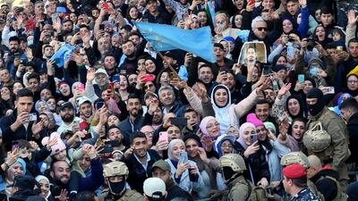 Supporters of the Hariri family crowd the streets. EPA