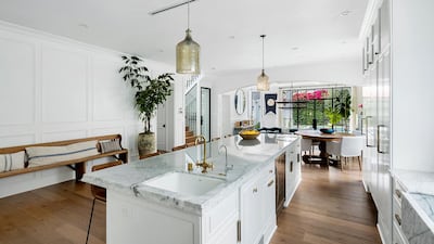 The kitchen opens on to the living room. Courtesy Engel & Volkers