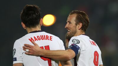 England's Harry Kane celebrates scoring their fifth goal with Harry Maguire. Reuters