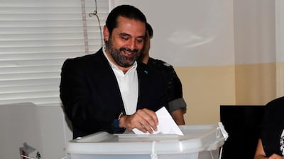 Lebanese Prime Minister Saad Hariri, casts his vote for Lebanon's parliamentary elections, at a polling station, in Beirut, Lebanon, on Sunday, May 6, 2018. Lebanon's polling stations have opened for the first parliamentary elections in nine years. Hussein Malla / AP Photo