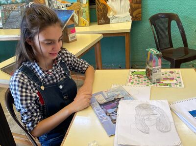 A Syrian refugee named Judi and her sketchbook at the Makani learning centre in Amman. Khaled Yacoub Oweis / The National