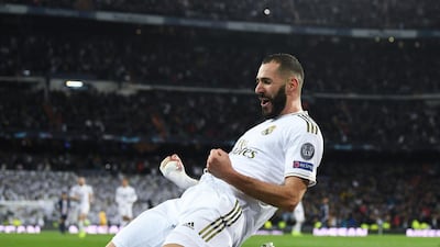 Karim Benzema celebrates after scoring Real Madrid's second goal against PSG. Getty