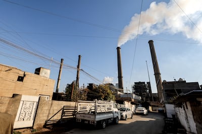 Homes next to a thermal power station in the Dora district of Baghdad. where a police commander was shot dead. AFP