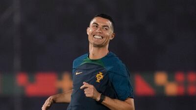 Portugal's Cristiano Ronaldo warms up during the Portugal's official training on the eve of the group H World Cup soccer match between Portugal and Ghana at the Al Shahaniya SC training site in Al Shahaniya, Qatar, Wednesday, Nov. 23, 2022. (AP Photo / Lee Jin-man)
