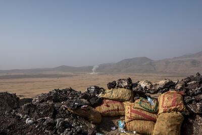 Smoke rises after a Houthi missile attack near the Kassarah front line. AP
