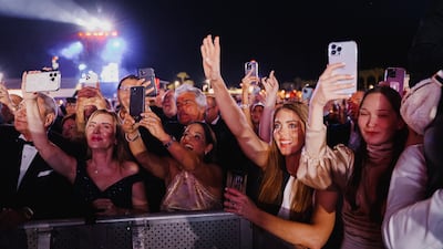 An excited crowd awaiting Australian pop star Kylie Minogue's performance on the main stage