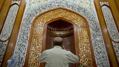 Verses from the Quran written in Thuluth script, a style of Islamic calligraphy, a style of Arabic calligraphy, decorate the Musawi Grand Mosque in Iraq's southern city of Basra. Ramadan earns money by teaching the discipline in schools but also sells his skill for advertisement purposes. All photos: AFP