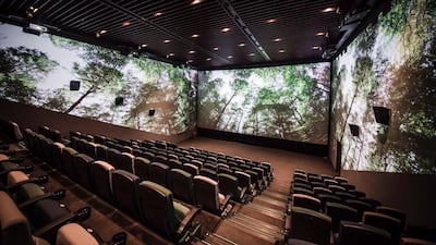 ScreenX, at Dubai Mall's Reel Cinemas, will project certain sections of film onto three walls, giving viewers a 270-degree experience. Courtesy Reel Cinemas