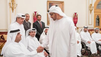 Sheikh Mohammed bin Zayed receives members of the UAE Paralympic team.