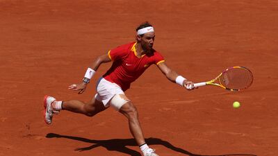 Rafael Nadal stretches for a forehand against Novak Djokovic. Getty Images