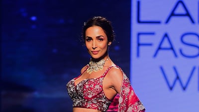 Bollywood actress Malaika Arora presents a creation by Varun Chkkilam during Lakme Fashion Week in Mumbai on February 14, 2020. AFP