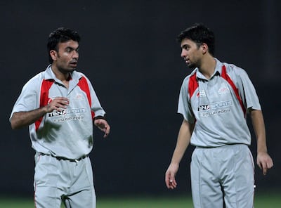 Alawi Shukri, right, with Salman Farooq during a T20 friendly in Sharjah in 2009. Paulo Vecina / The National