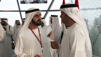 Sheikh Mohammed bin Rashid, Vice President and Ruler of Dubai (L) speaks with Sheikh Hamed bin Zayed, Chairman of the Crown Prince Court of Abu Dhabi and Abu Dhabi Executive Council Member (R), on the final day of the 2018 Formula 1 Etihad Airways Abu Dhabi Grand Prix, in Shams Tower. Ryan Carter / Ministry of Presidential Affairs