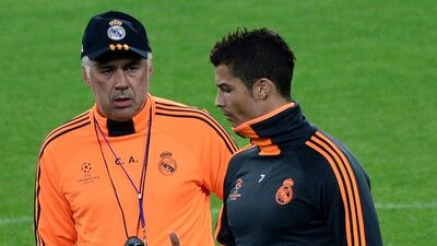 Real Madrid coach Carlo Ancelotti, left, says forward Cristiano Ronaldo will sit out their Group B match against Galatasaray in the Uefa Champions League on Wednesday night. Giuseppe Cacace / AFP