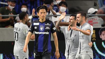 PSG's Lionel Messi celebrates scoring with Pablo Sarabia and Neymar. EPA
